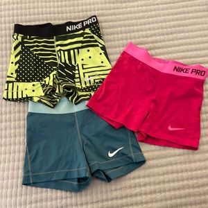 Three Nike Pro Dri-Fit Shorts